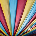 Vibrant canopy with red, blue, and yellow stripes forming a mesmerizing pattern